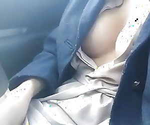 Asian Beauti masturbates on car